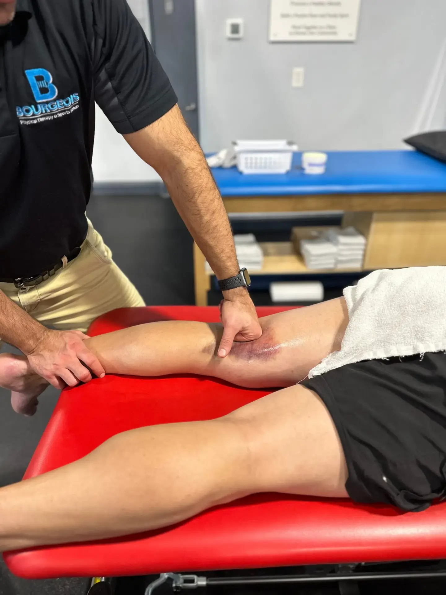 Physical therapist working one-on-one with a patient